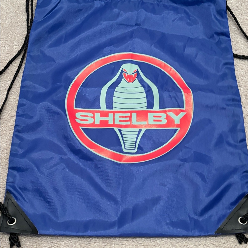 Carroll Shelby Blue Drawstring Backpack VIP Kit Cobra Logo Bag Knapsack